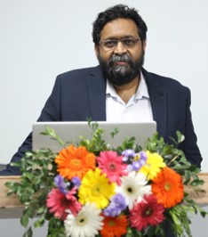 Dr. Renu John